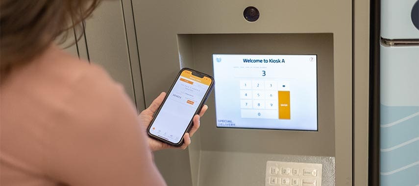 Using the Premier Parcel phone app at kiosk